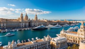 Luxury yachts docked in a harbor with ornate buildings and clear blue water